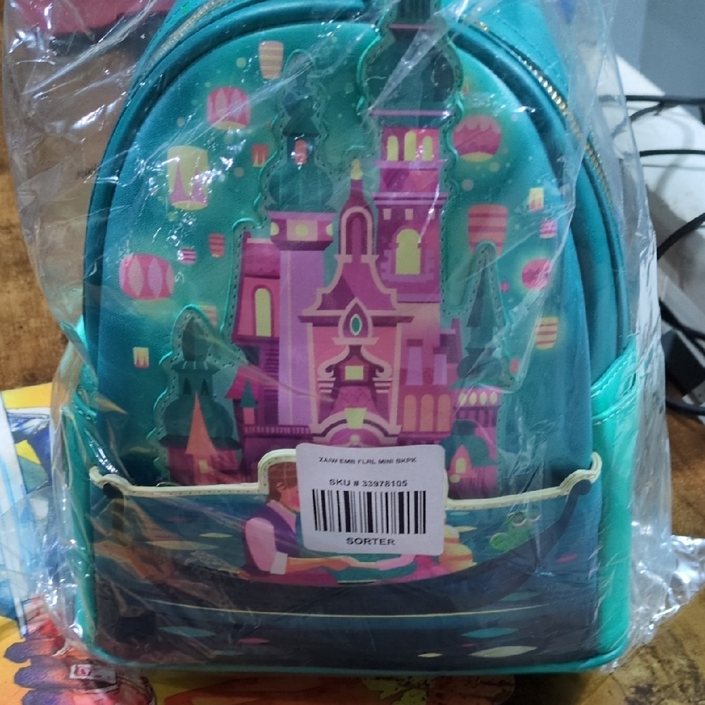 Loungefly Turquoise and Pink Castle Backpack